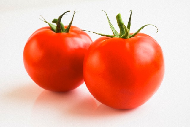Tomatoes on white background, studio shot
